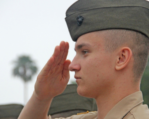 a military school cadet saluting