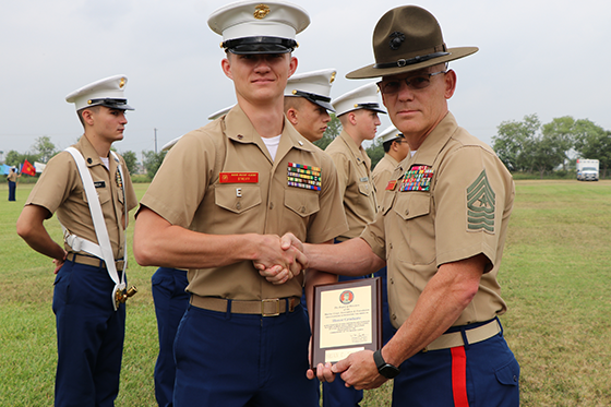 Cadet receiving an end of year award