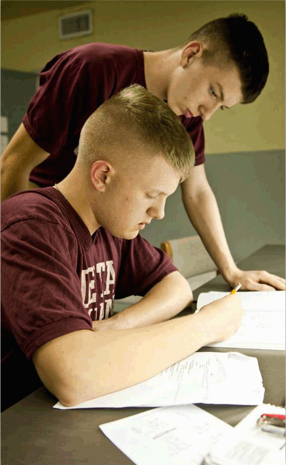 military school cadets studying together