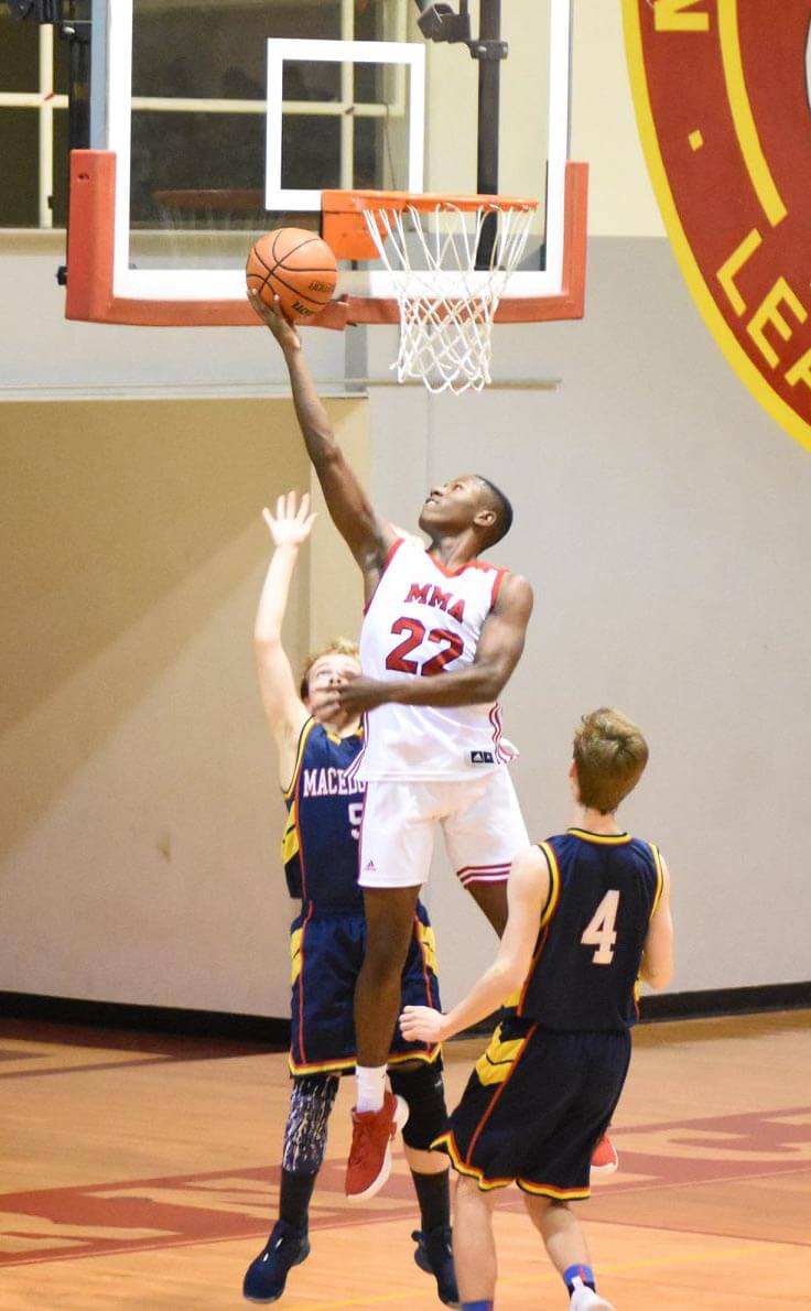 military school cadet playing varsity basketball