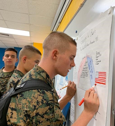 Cadet at the whiteboard in class